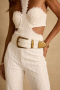 Model wearing the 12th Tribe Jasper White and Gold Statement Belt, featuring bold white and gold detailing for a luxe, eye-catching look, perfect for layering over dresses, skirts, or high-waist trousers to elevate everyday outfits, evening wear, and special occasions