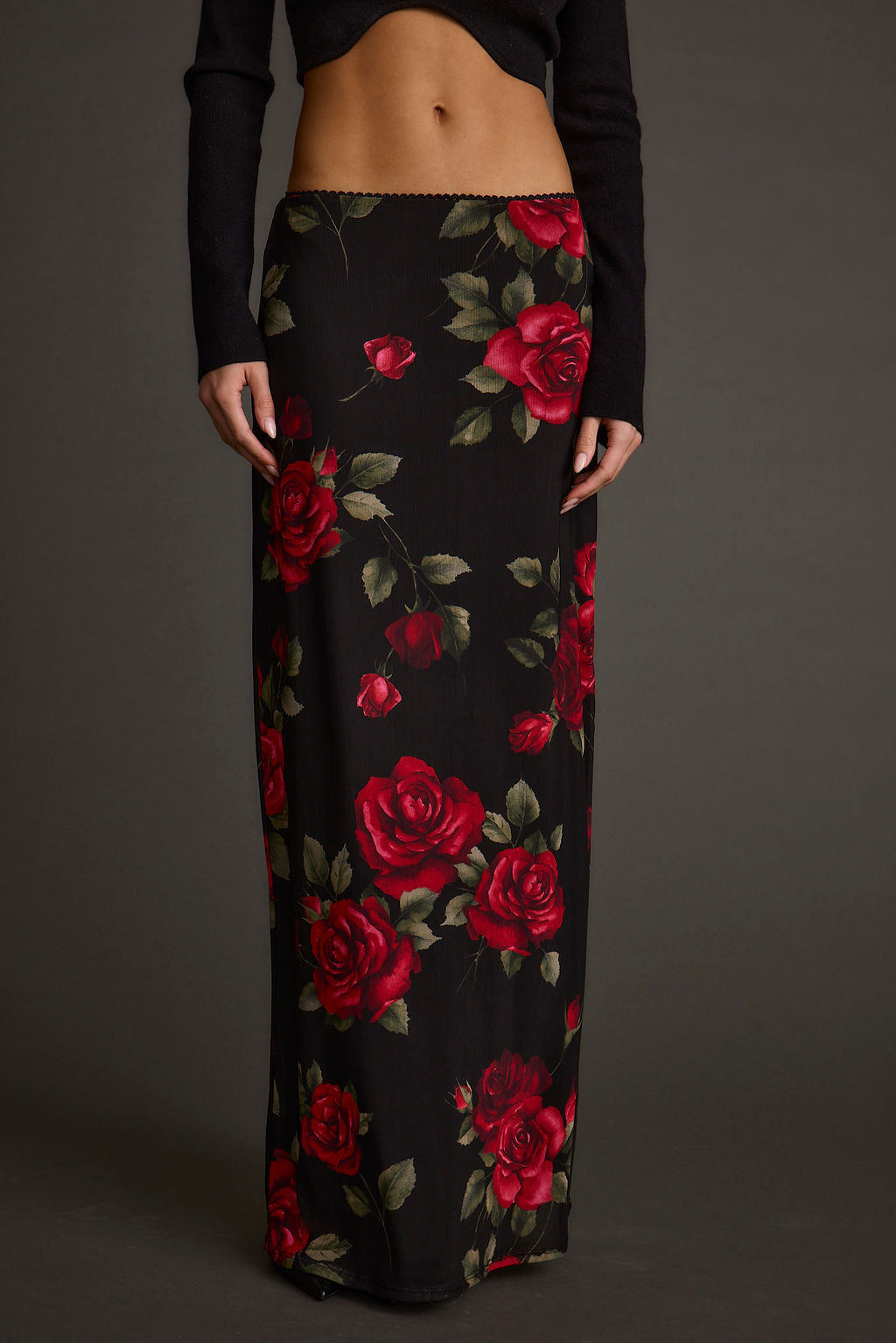 Close-up of the Julia Red Rose Mesh Maxi Skirt showcasing the mesh texture and craftsmanship.