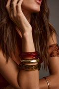 Gold piece with refined detailing and a flattering silhouette.