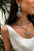 Silver earrings with refined detailing and an elegant finish.