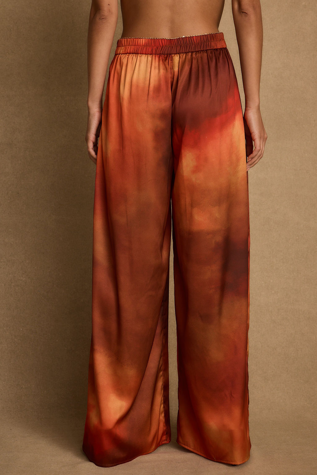Close-up of the Kira Sunset Ombre Pant showcasing the fabric texture and design details.
