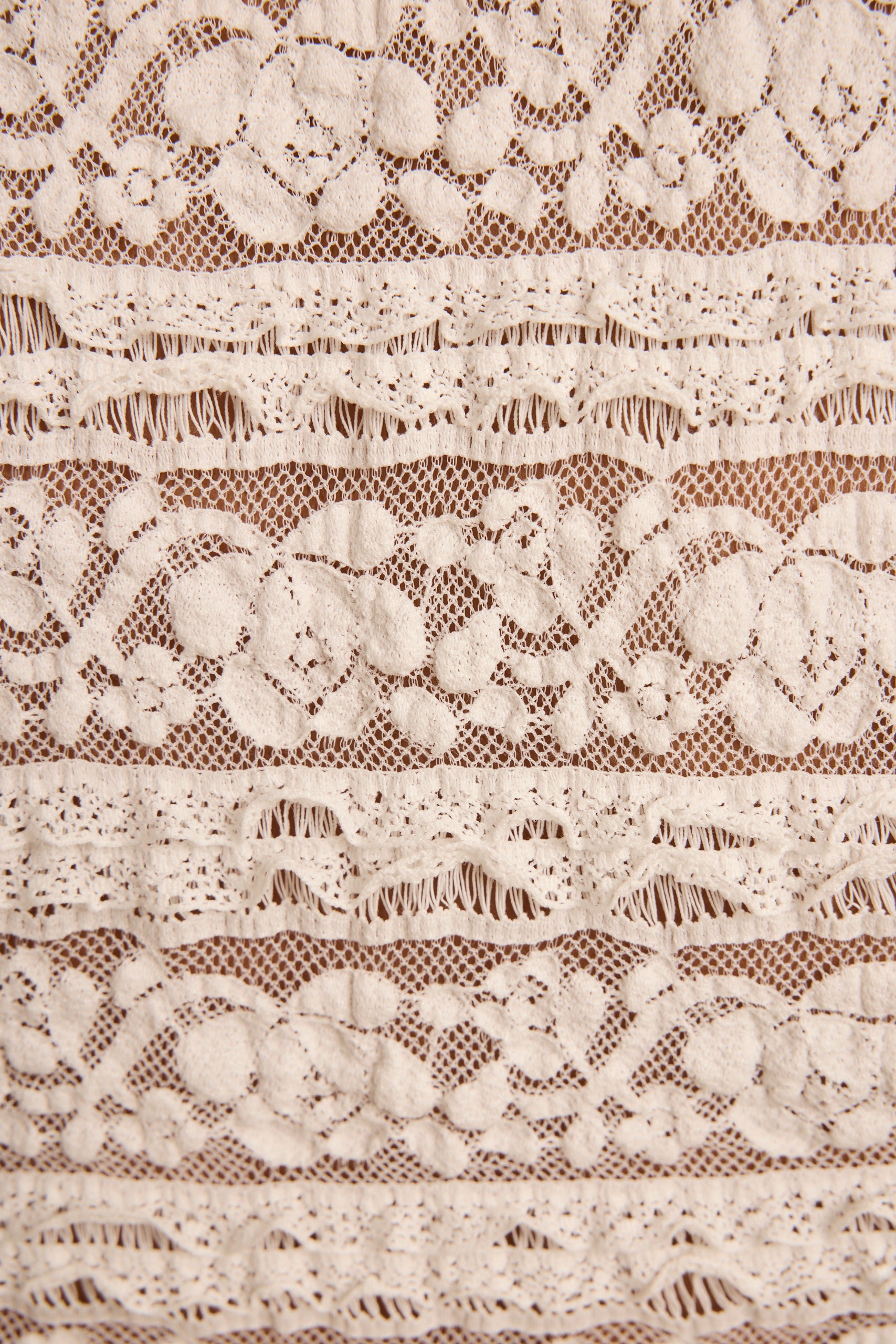 Kristina White Lace Top paired with complementary accessories for a polished look.