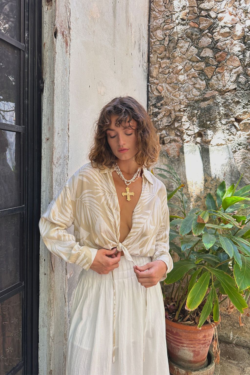 Kiana Beige Palm Print Wrap Top paired with complementary accessories for a polished look.