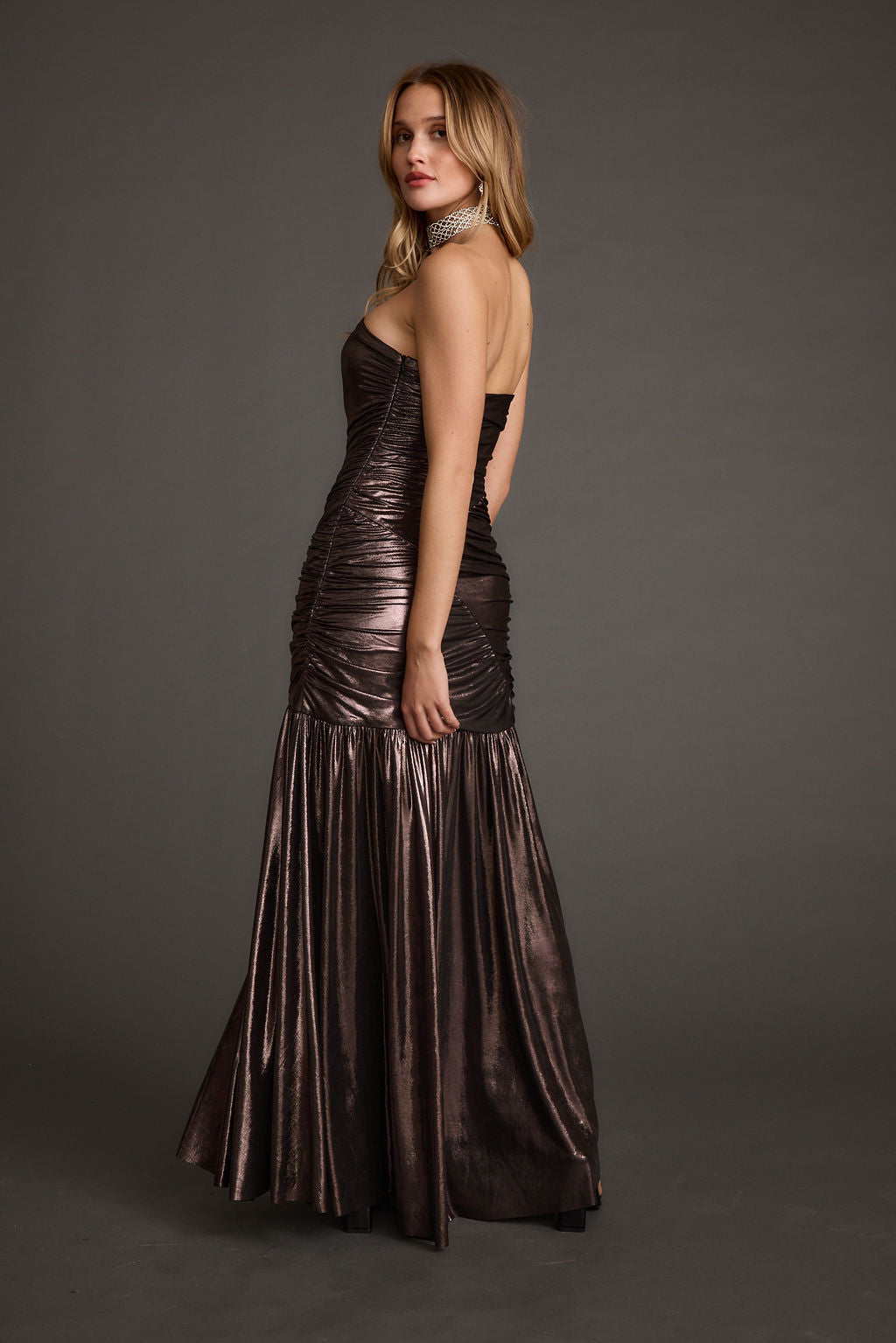 Back view of the metallic metallic maxi dress showing the silhouette and fit.
