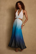 Blue halter maxi dress with elegant accents, a vacation maxi dress essential.