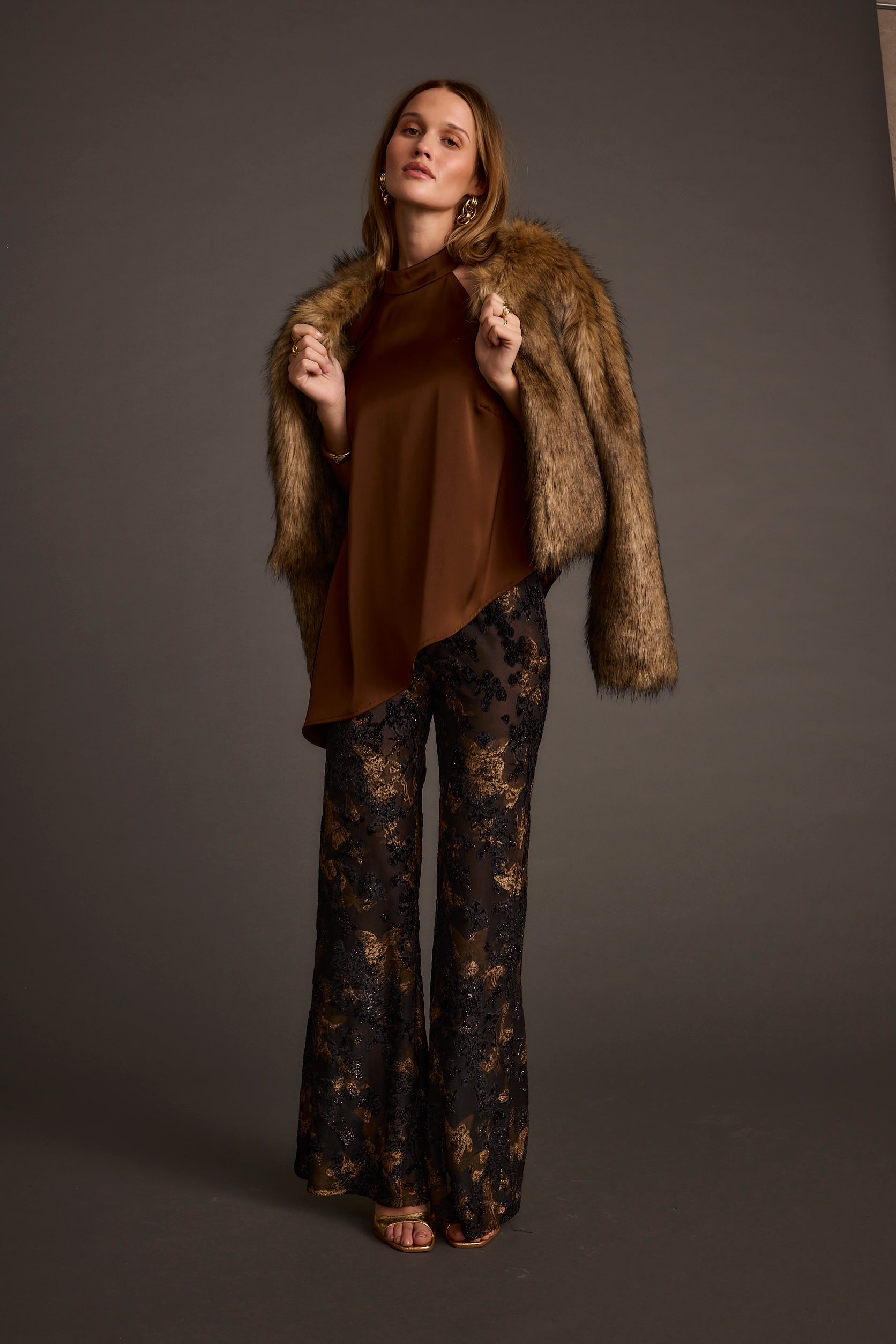 Alternate angle of the mocha halter top highlighting the overall design.