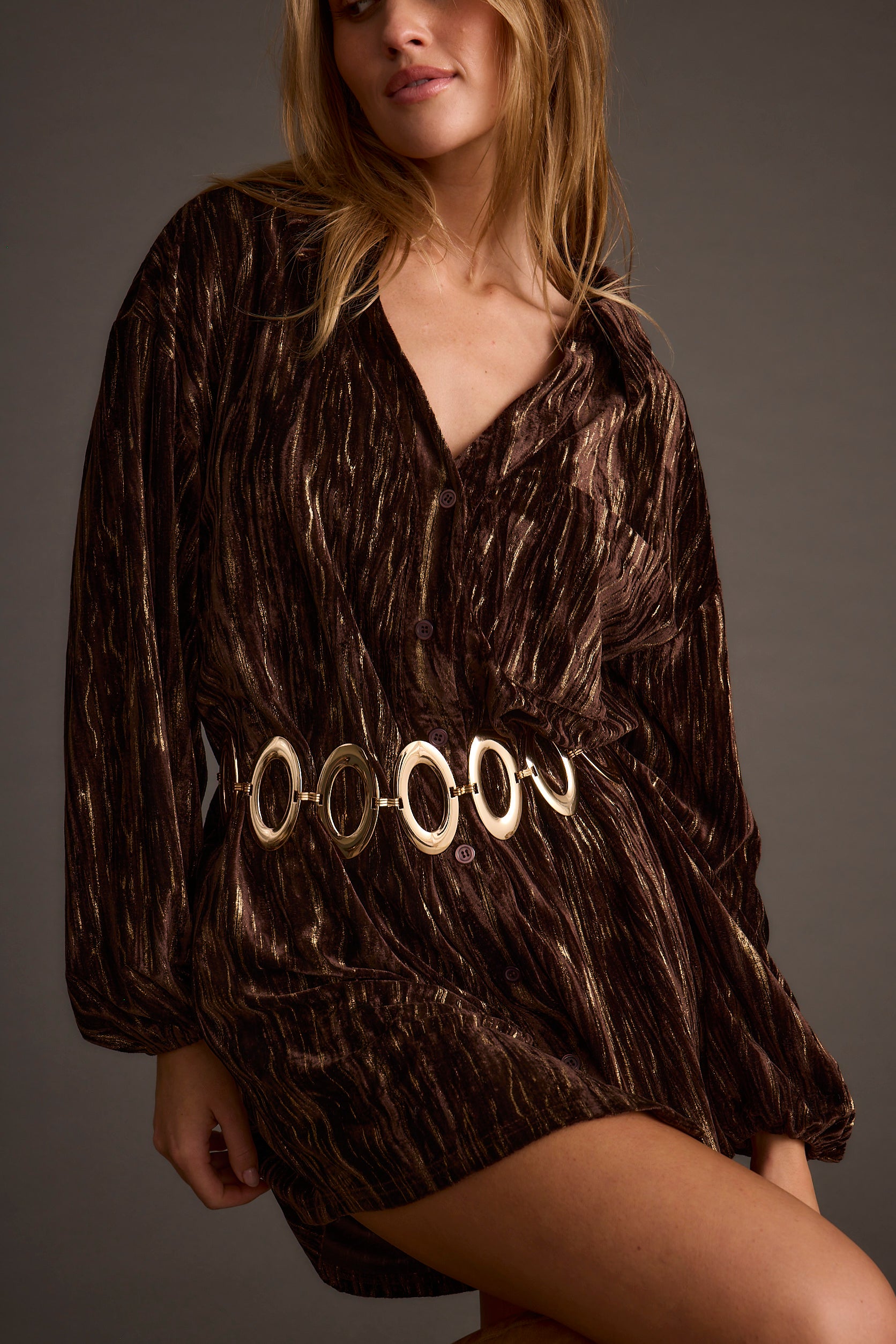 Back view of the espresso velvet mini dress showing the silhouette and fit.