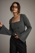 Top with elegant accents, a long sleeve sequin top essential.