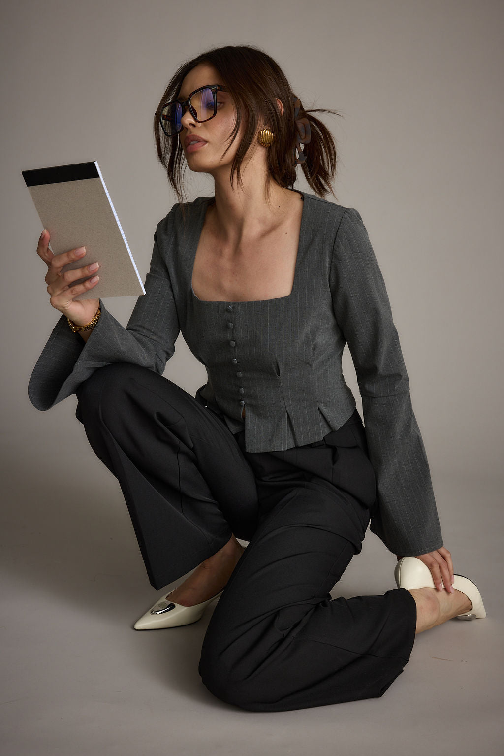 Detail shot of the McGrath Grey Pinstripe Long Sleeve Top highlighting the design elements.