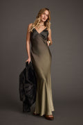 Alternate angle of the olive maxi dress highlighting the overall design.