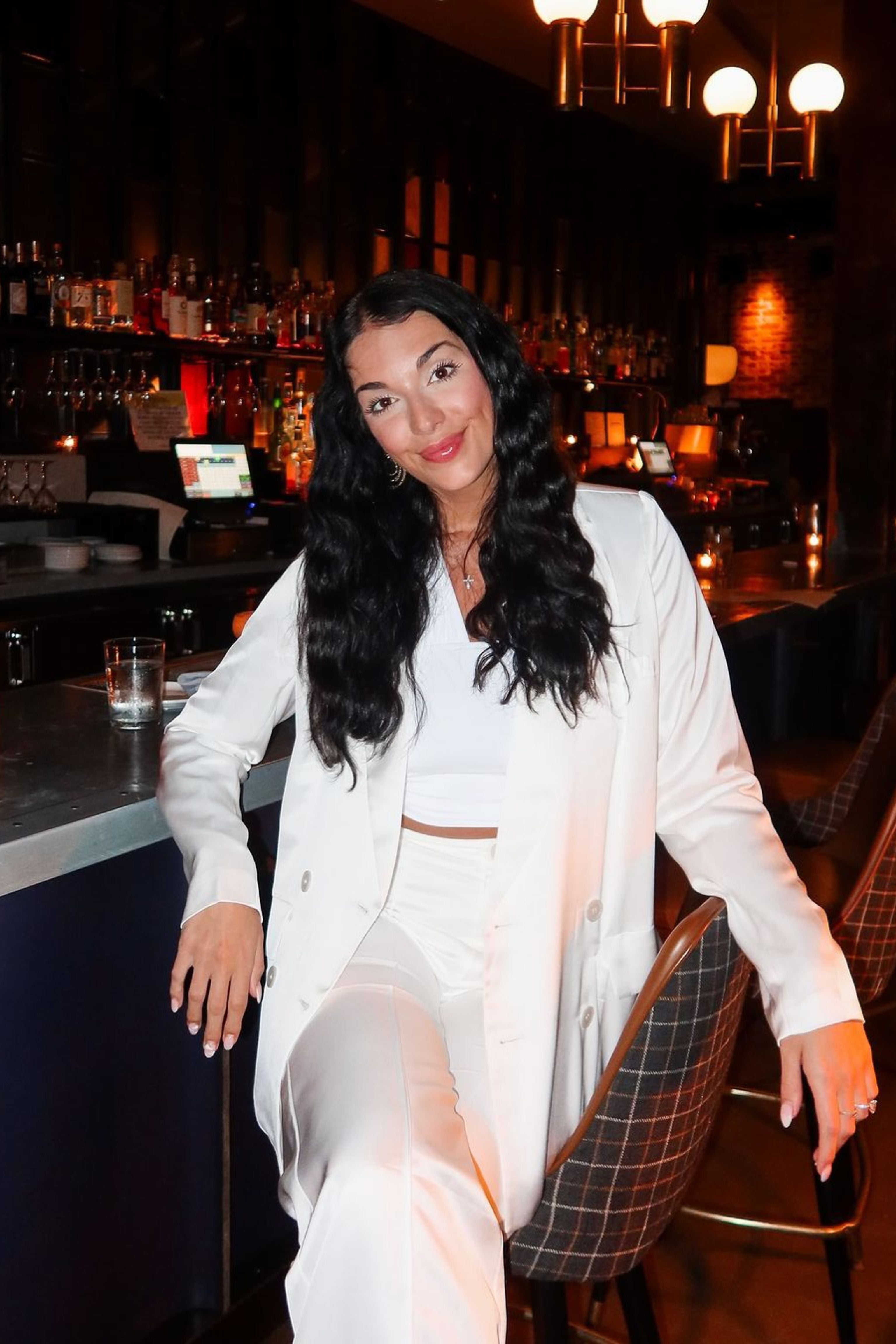 Madison White Satin Blazer paired with complementary accessories for a polished look.