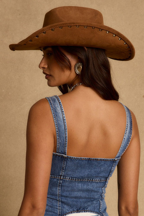 Alternate view of the brown cowboy hat showing the design and craftsmanship.