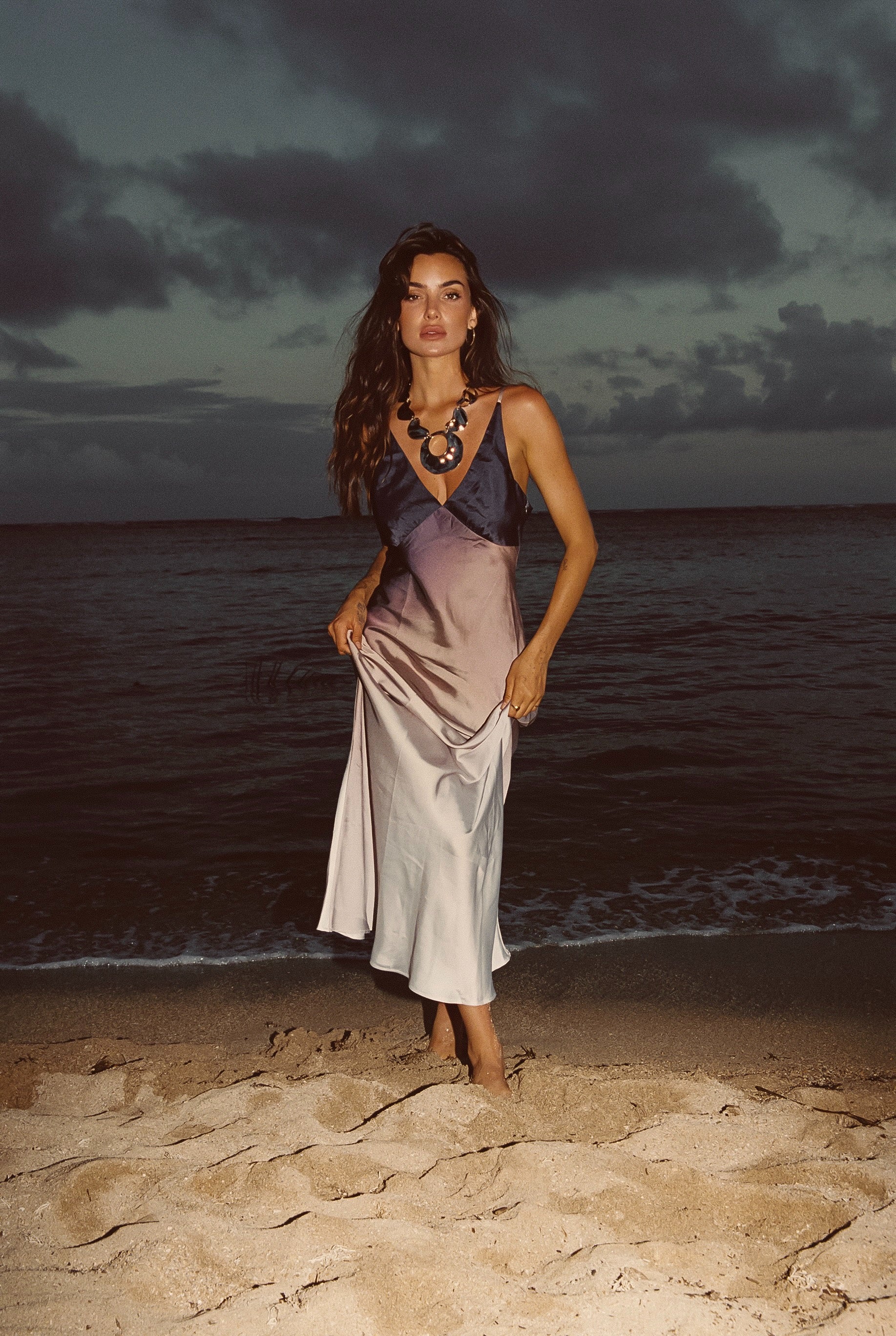 Brown satin maxi dress with refined accents, a satin mini dress essential.