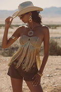 Model wearing the 12th Tribe Moonbloom Gold Fringe Top, a metallic gold strapless top featuring fringe trim, gold fringe detailing, and an adjustable tie-back closure, perfect for festival-ready looks, summer soirées, and stylish warm-weather outfits