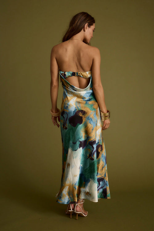 Back view of the blue maxi dress showing the silhouette and fit.