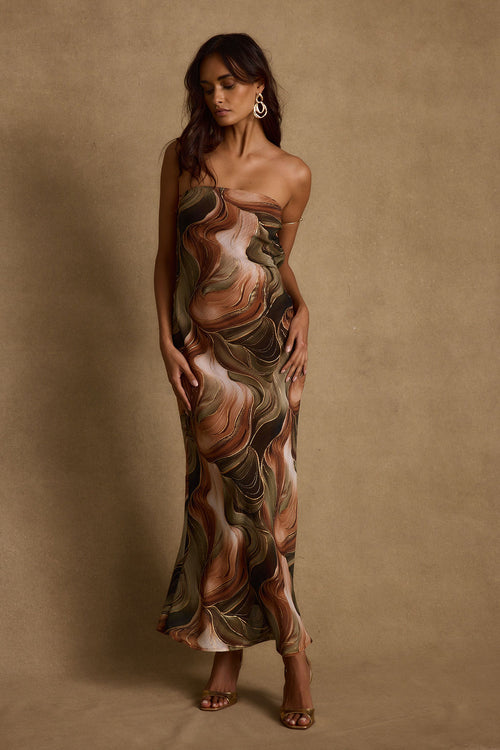 Back view of the olive maxi dress showing the silhouette and fit.