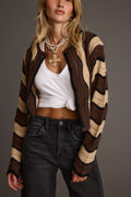 Brown cardigan with refined detailing and a flattering silhouette.