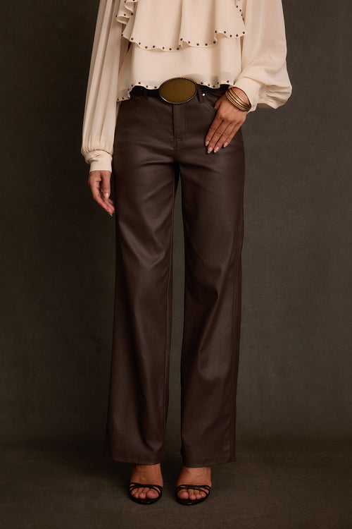 Coated pants in mocha styled with espresso surplice sweater and gold belt