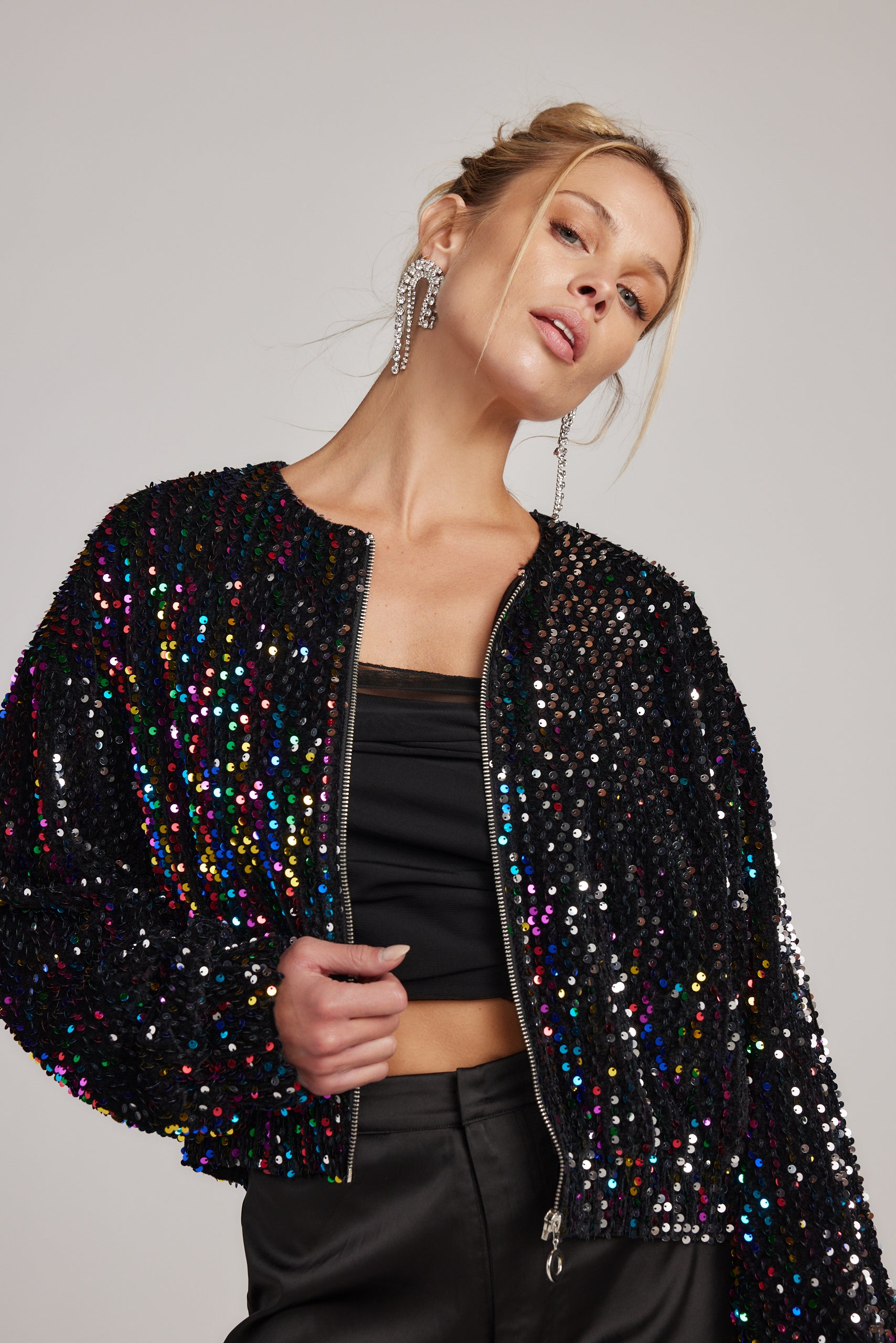 Detail shot of the Ozzy Multi Sequin Zip Up Jacket highlighting the sequin elements.