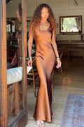 Alternate angle of the bronze maxi dress highlighting the overall design.