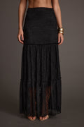Black lace maxi skirt with refined detailing and a flattering silhouette.