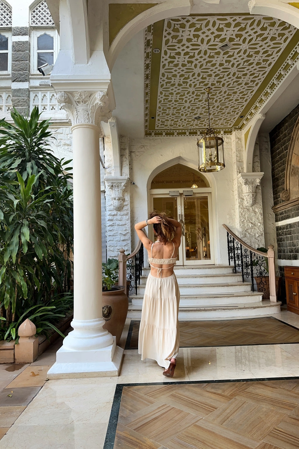 Paola Beige Boho Maxi Dress paired with complementary accessories for a polished look.
