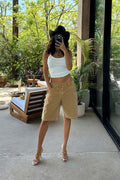 Khaki low-rise shorts with elegant accents, a low rise khaki shorts standout.