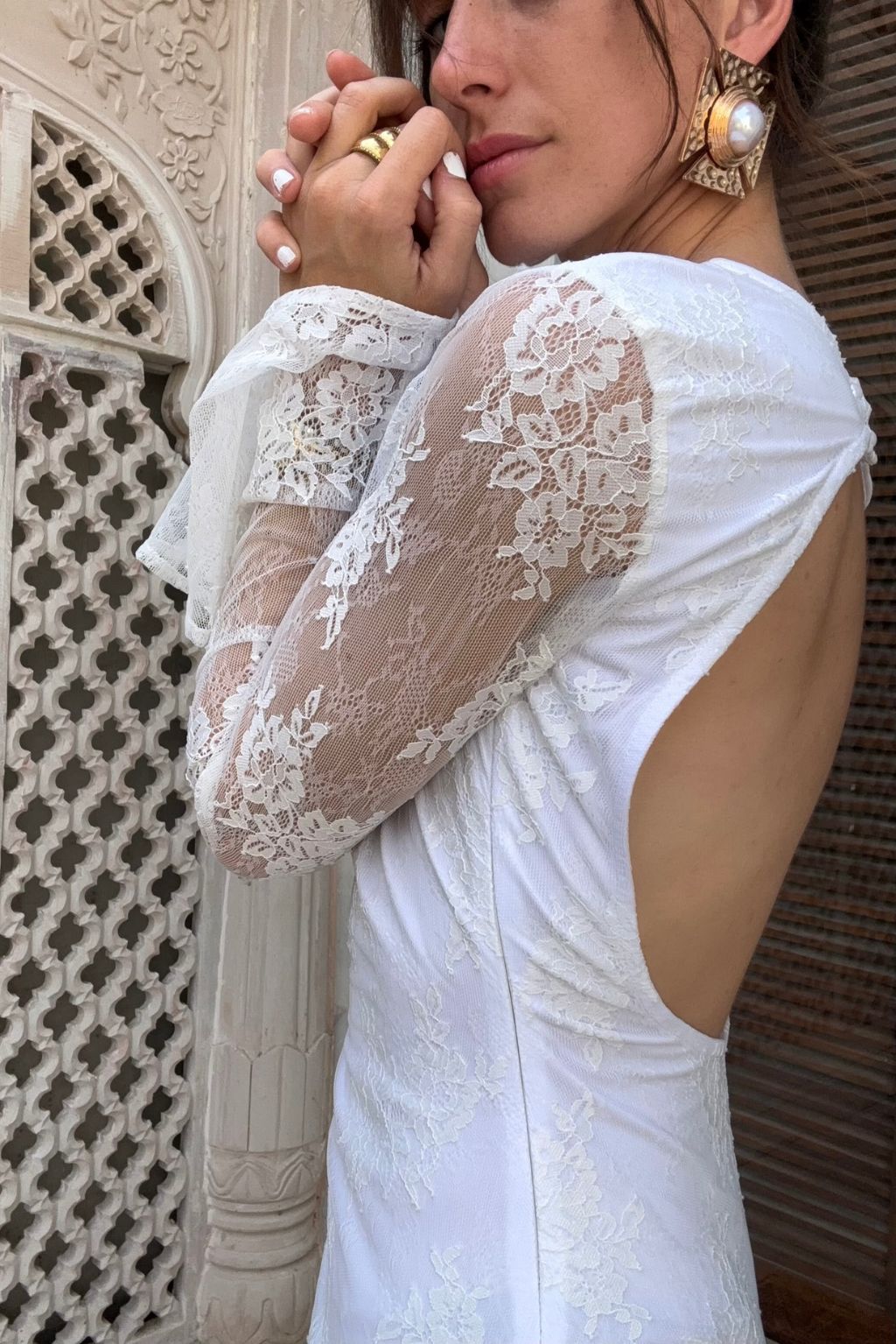 Primrose Long Sleeve Lace Mini Dress paired with complementary accessories for a polished look.