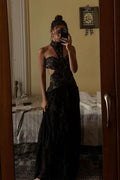 Black lace drop-waist maxi dress with lace accents, a drop waist dress essential.