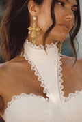 Gold pearl earrings with refined detailing and an elegant finish.