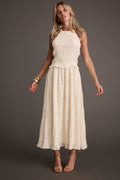 Ivory chiffon high-neck maxi dress with chiffon accents, a vacation maxi dress essential.