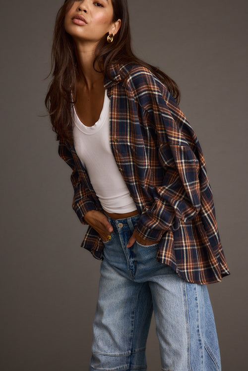 Navy piece with refined detailing and a flattering silhouette.