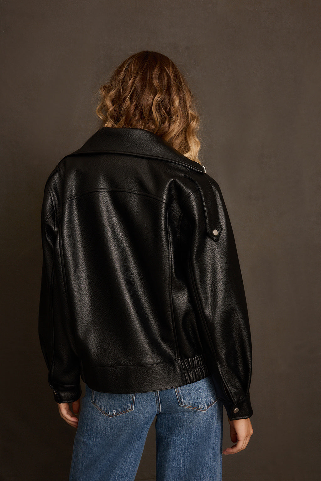 Fall jacket back view showing clean back panel and oversized boxy silhouette