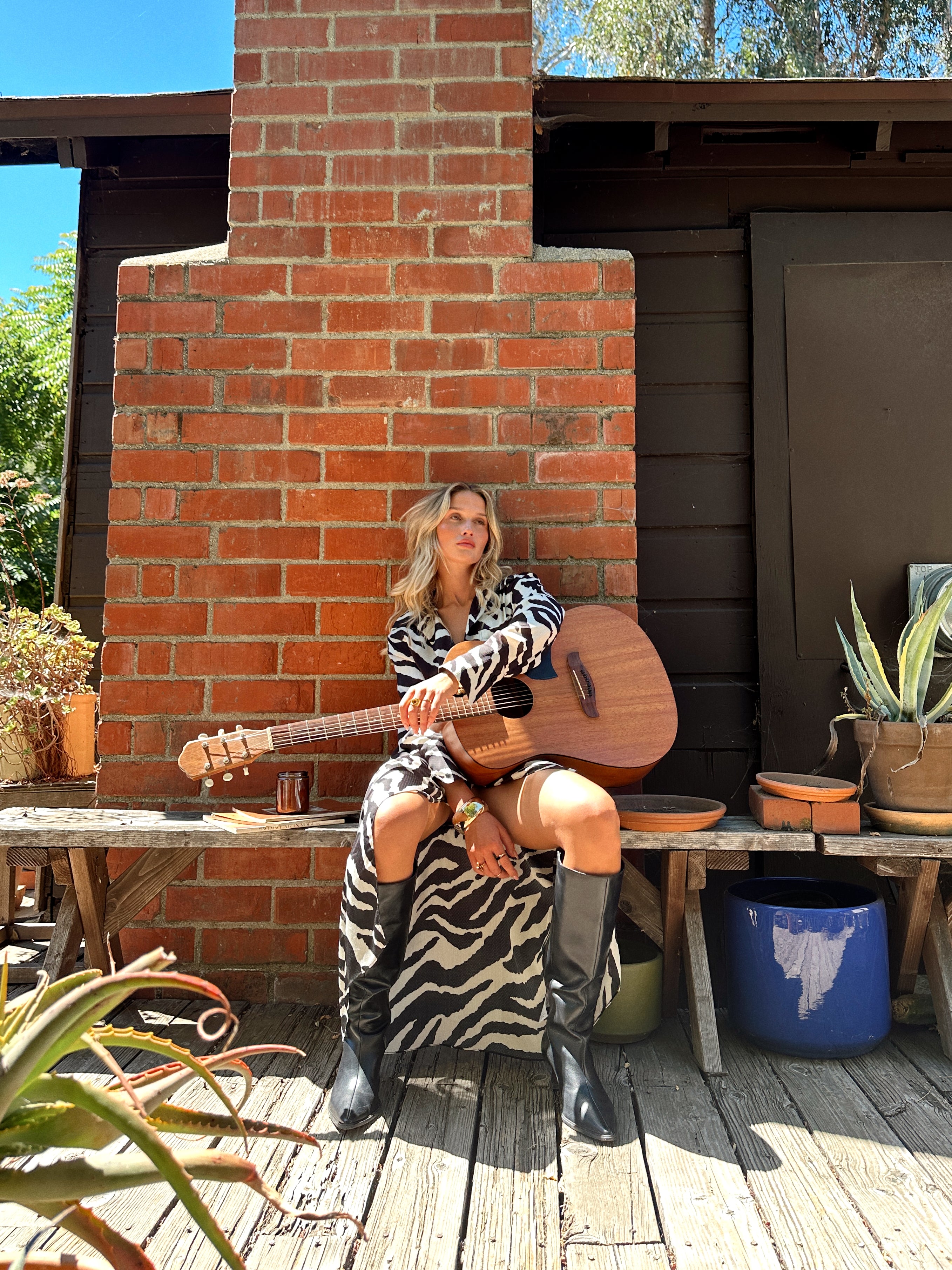 Renna Zebra Long Sleeve Wrap Midi Dress shown in a complementary styling arrangement.