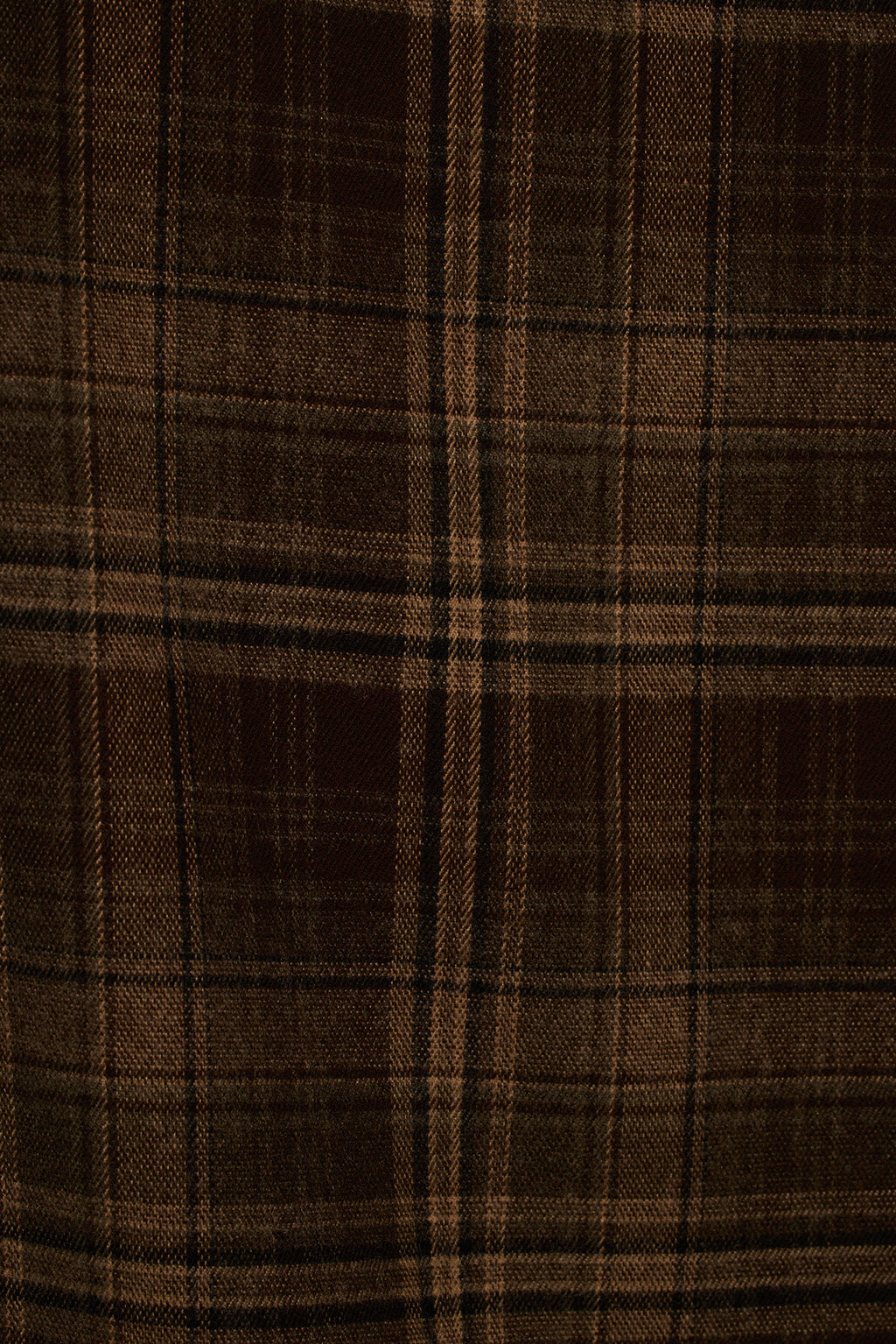Olive plaid fabric close-up showing woven check pattern in olive, tan, and brown