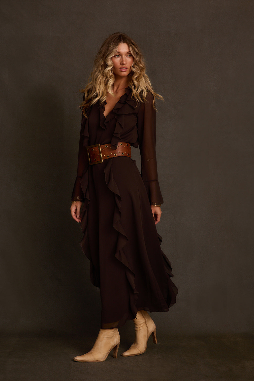 Fall dress side angle with ruffle front panel, bell sleeves, and floor-length chiffon skirt