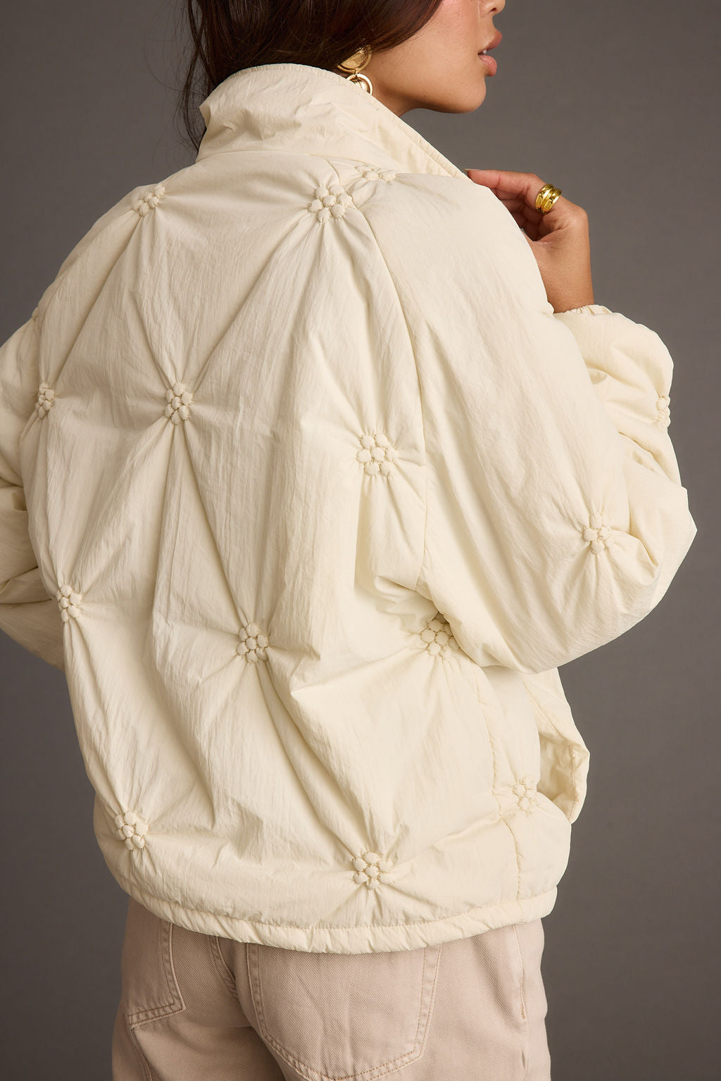 Rosey Cream Zip Front Puffer Coat styled in a complete look from an alternate angle.