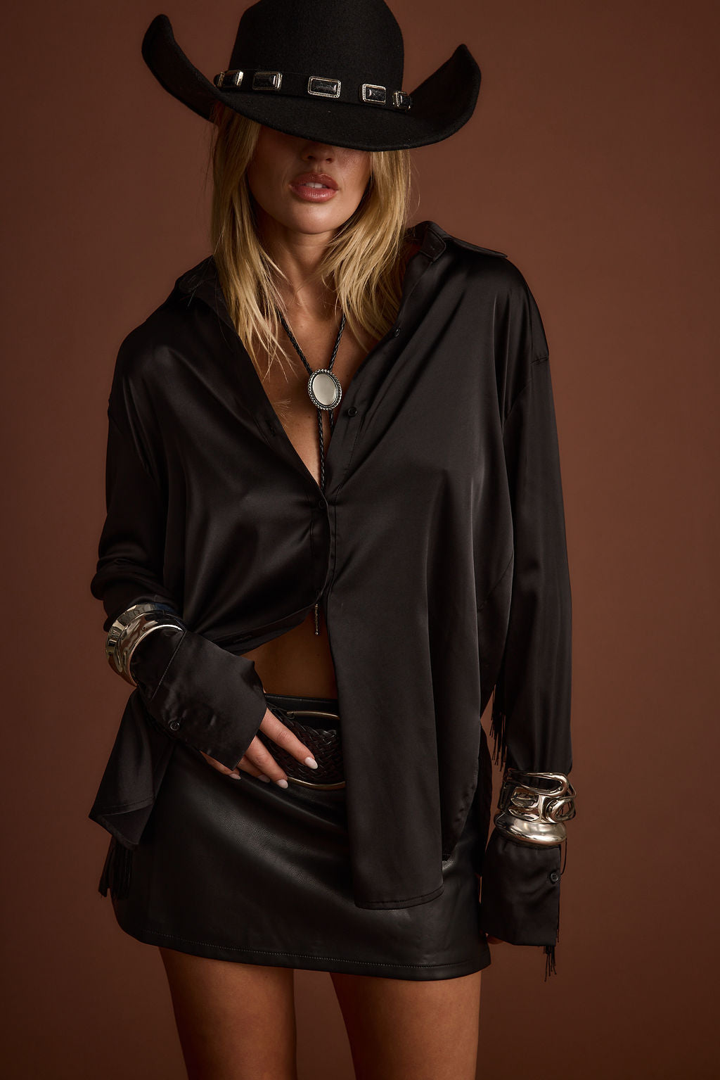Close-up of the Santana Black Fringe Button Up Top showcasing the fringe texture and craftsmanship.