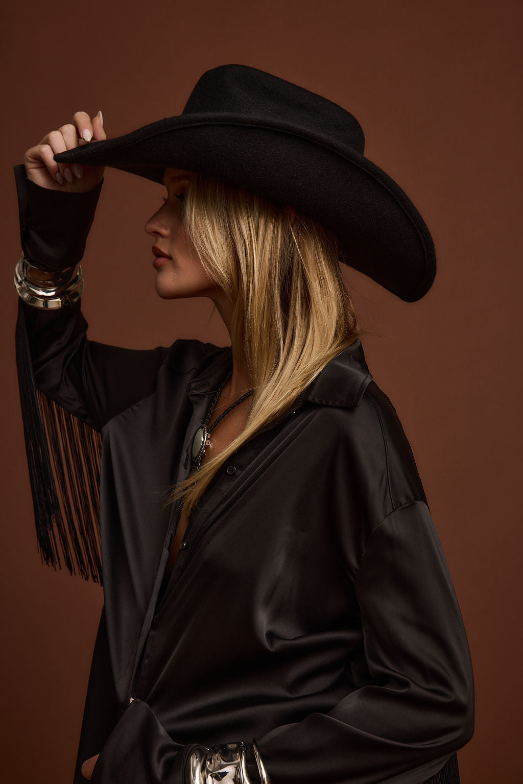 Santana Black Fringe Button Up Top styled in a complete look from an alternate angle.