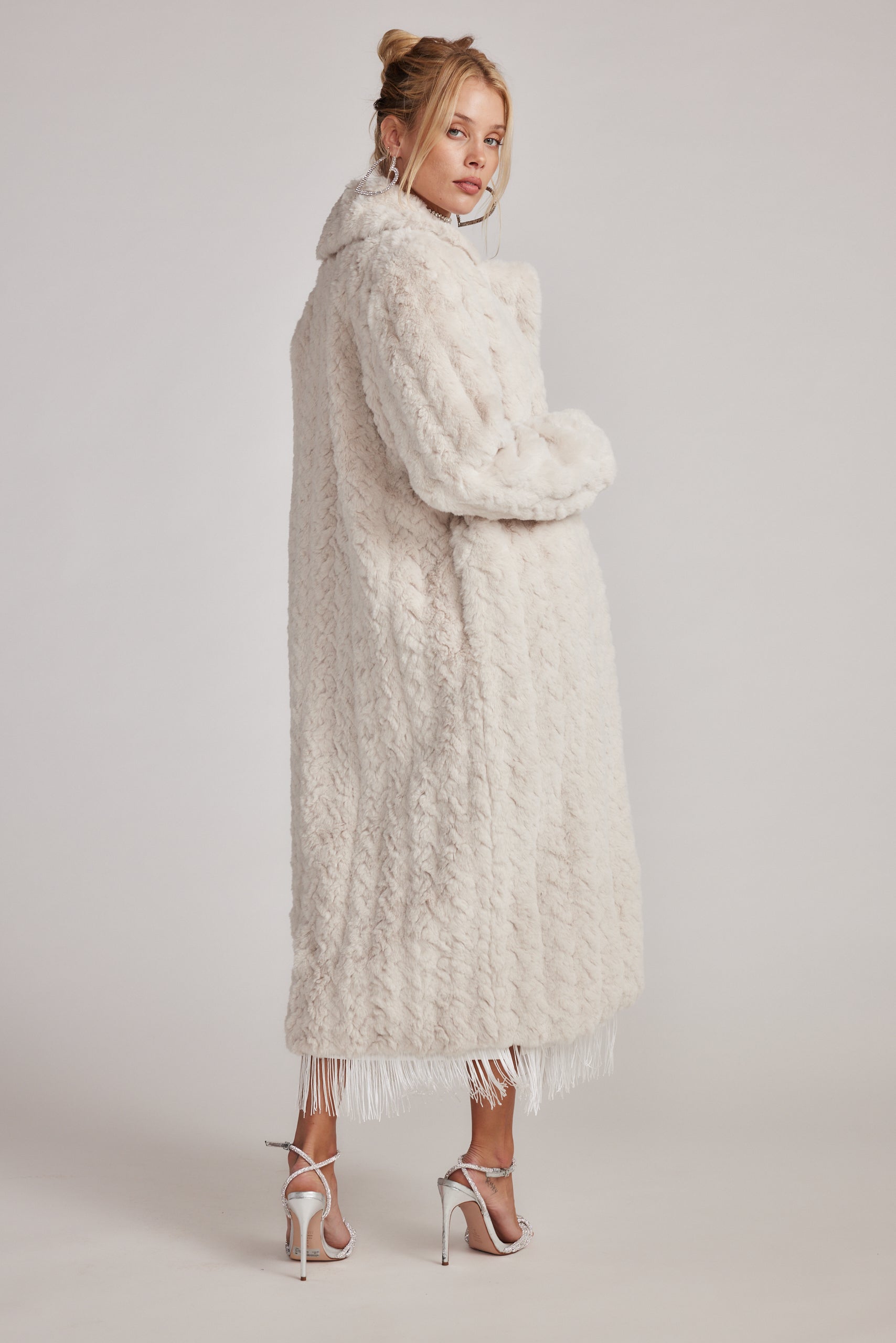 Sasha Cream Floor Length Coat shown in a complementary styling arrangement.