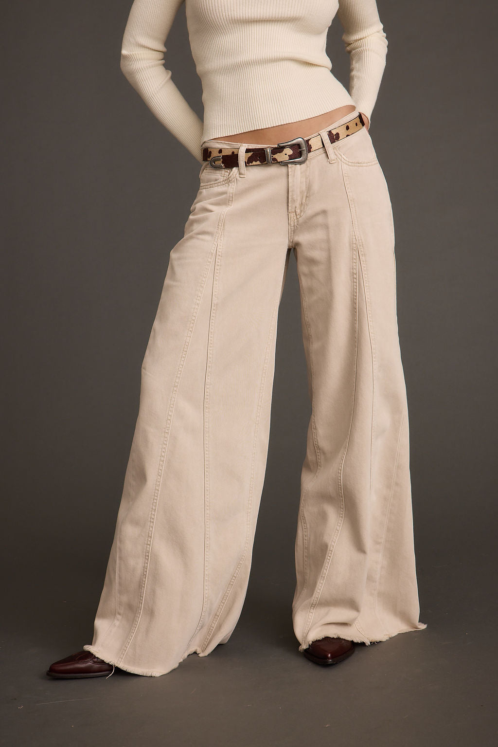 Sierra Beige Low Rise Wide Leg Jean paired with complementary accessories for a polished look.