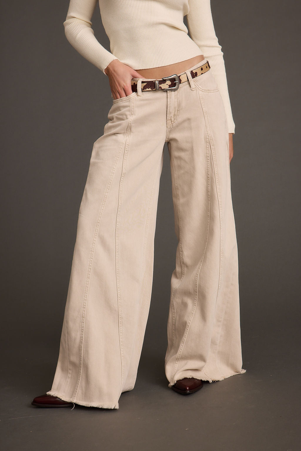Detail shot of the Sierra Beige Low Rise Wide Leg Jean highlighting the low-rise, wide-leg elements.