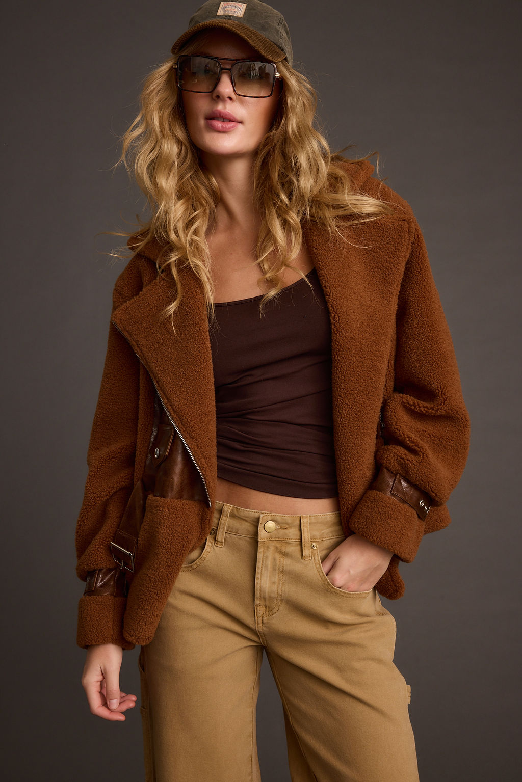 Lifestyle shot of the mocha jacket styled for day-to-night versatility.