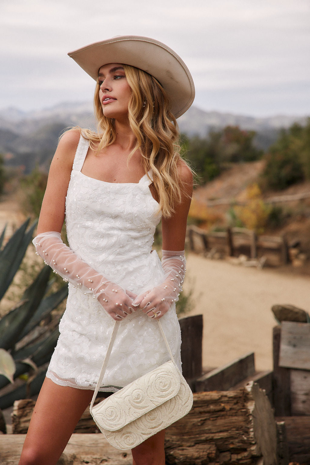 Detail shot of the Stella White Printed Sequin Mini Dress highlighting the sequin elements.