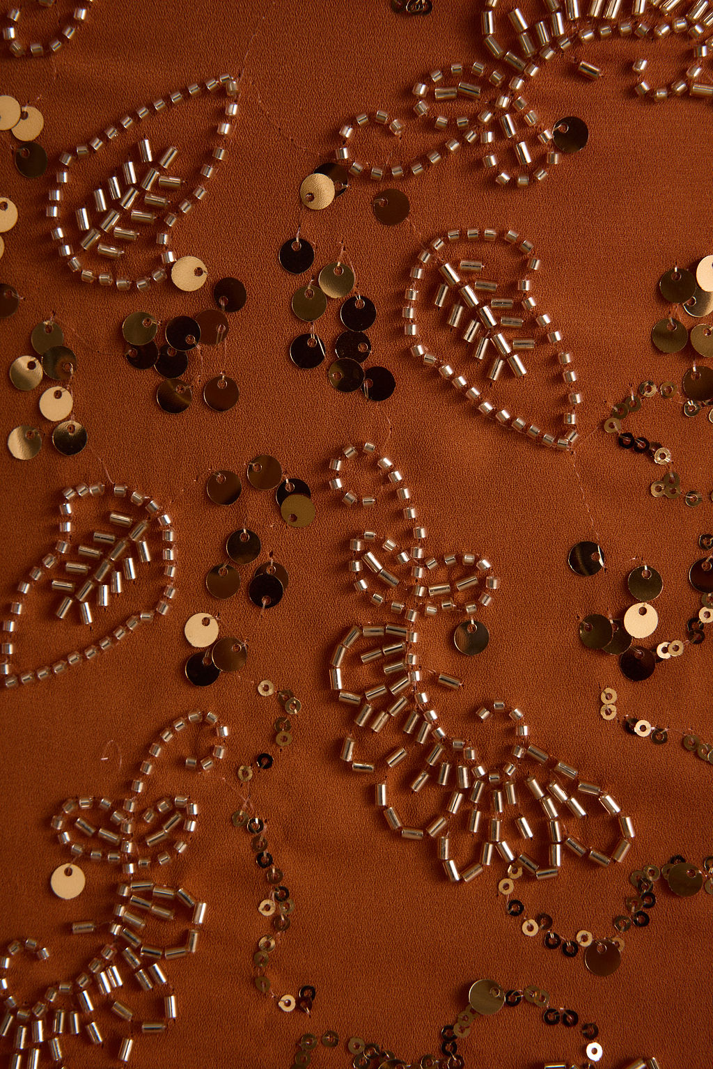 Additional view of the Sunset Orange Halter Top from a different perspective.