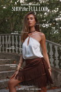 Resort Terrace look: ivory Jada halter top, brown Canela fringe sarong, Villa jewelry.