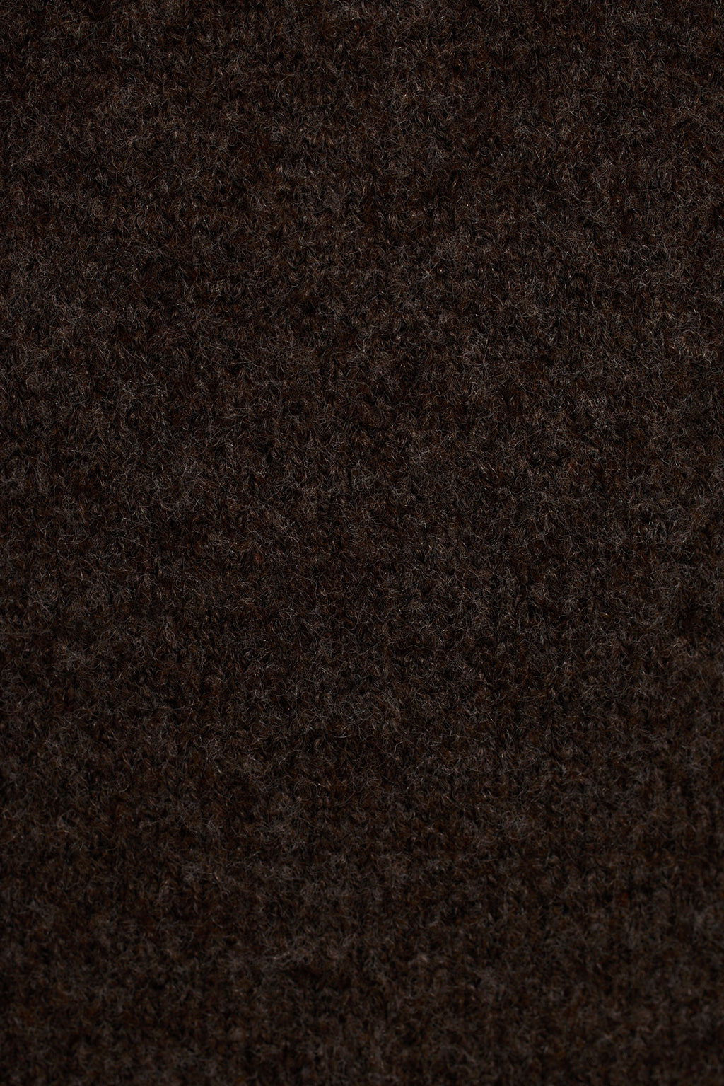 Charcoal knit dress fabric texture close-up showing soft yarn and stitch detail