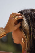 Gold ring with refined detailing and an elegant finish.