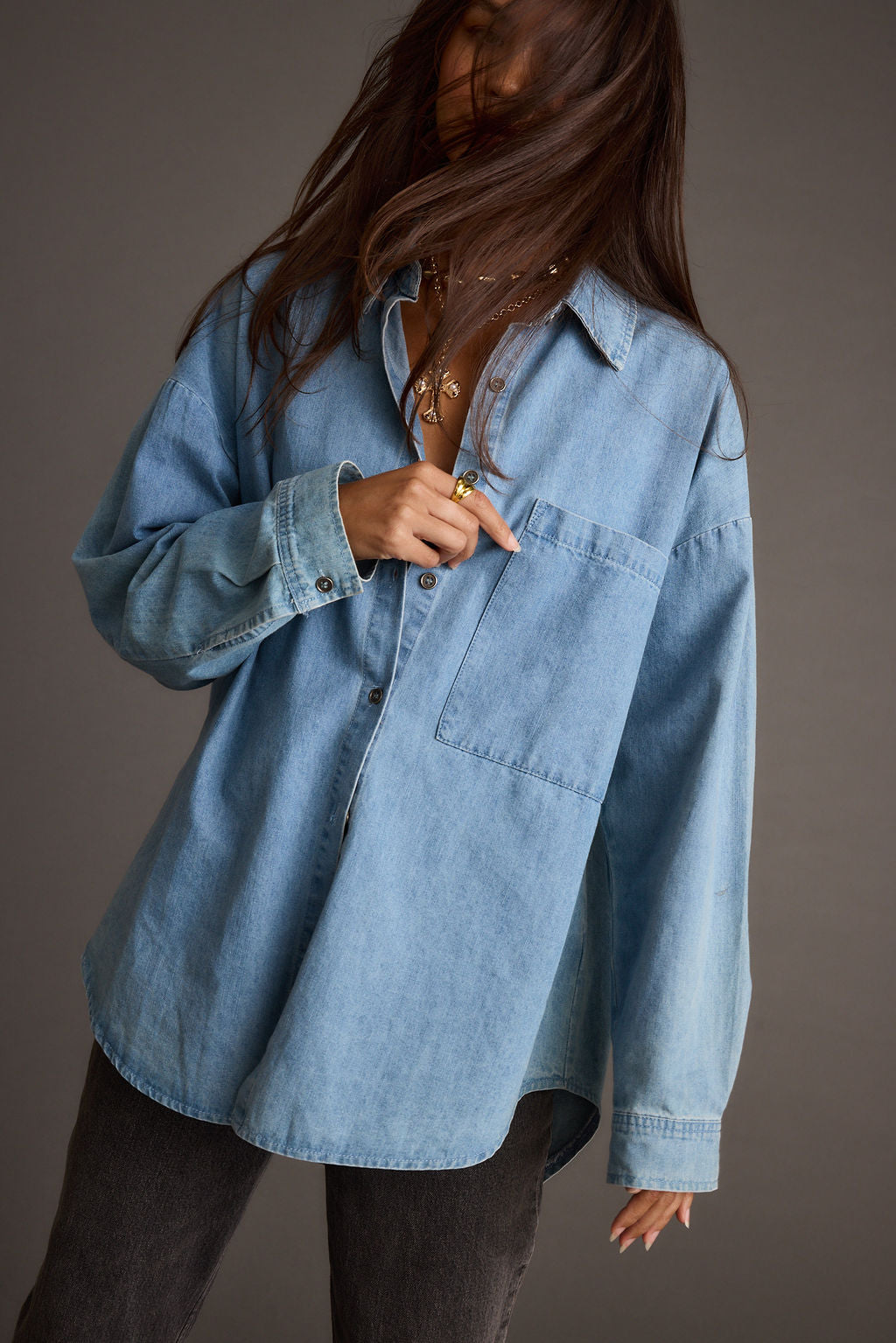 Springsteen Chambray Oversized Button Down Shirt paired with complementary accessories for a polished look.