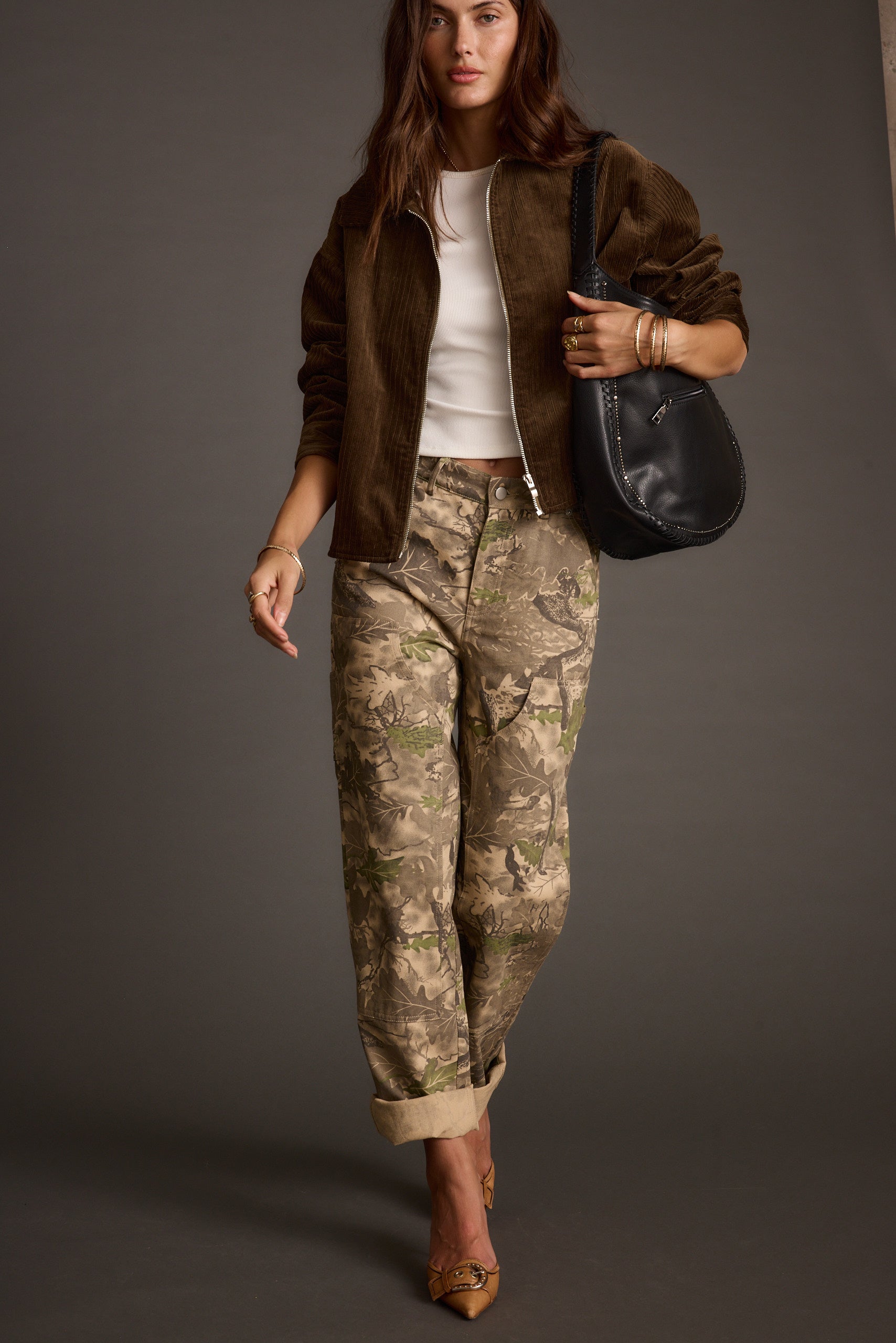 Lifestyle shot of the jeans styled for day-to-night versatility.